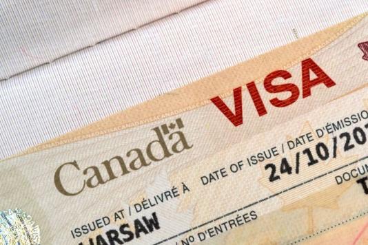 A close up view of a Canadian visa document
