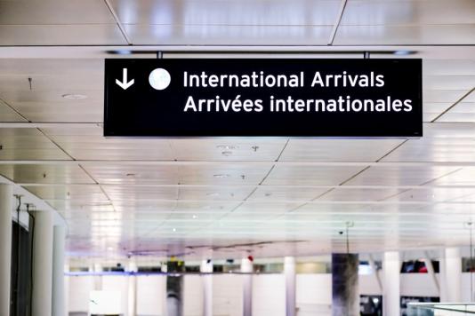 A Canadian International Arrivals sign 